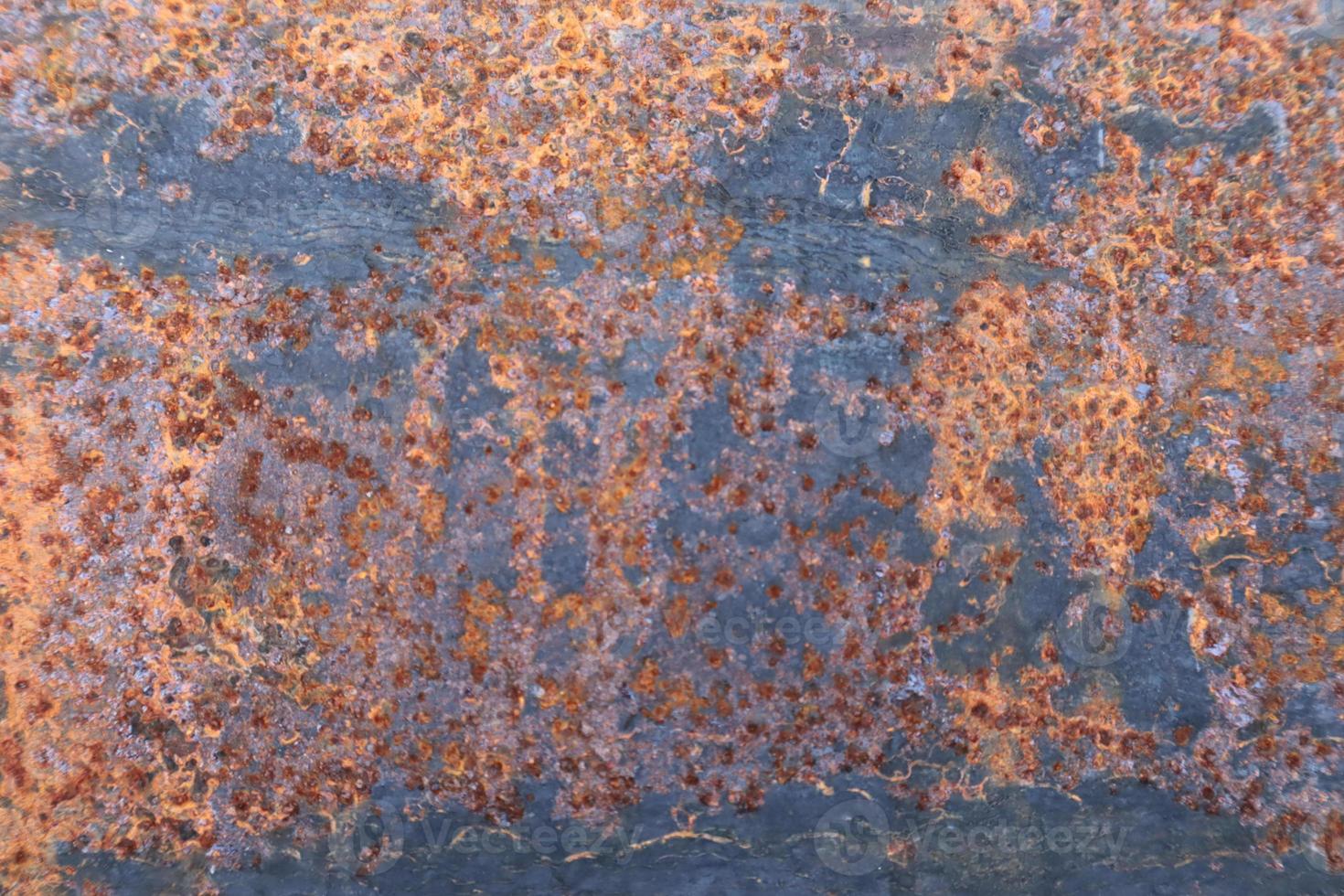 vermelho enferrujado no fundo de textura de folha de metal, padrão enferrujado e metal oxidado foto