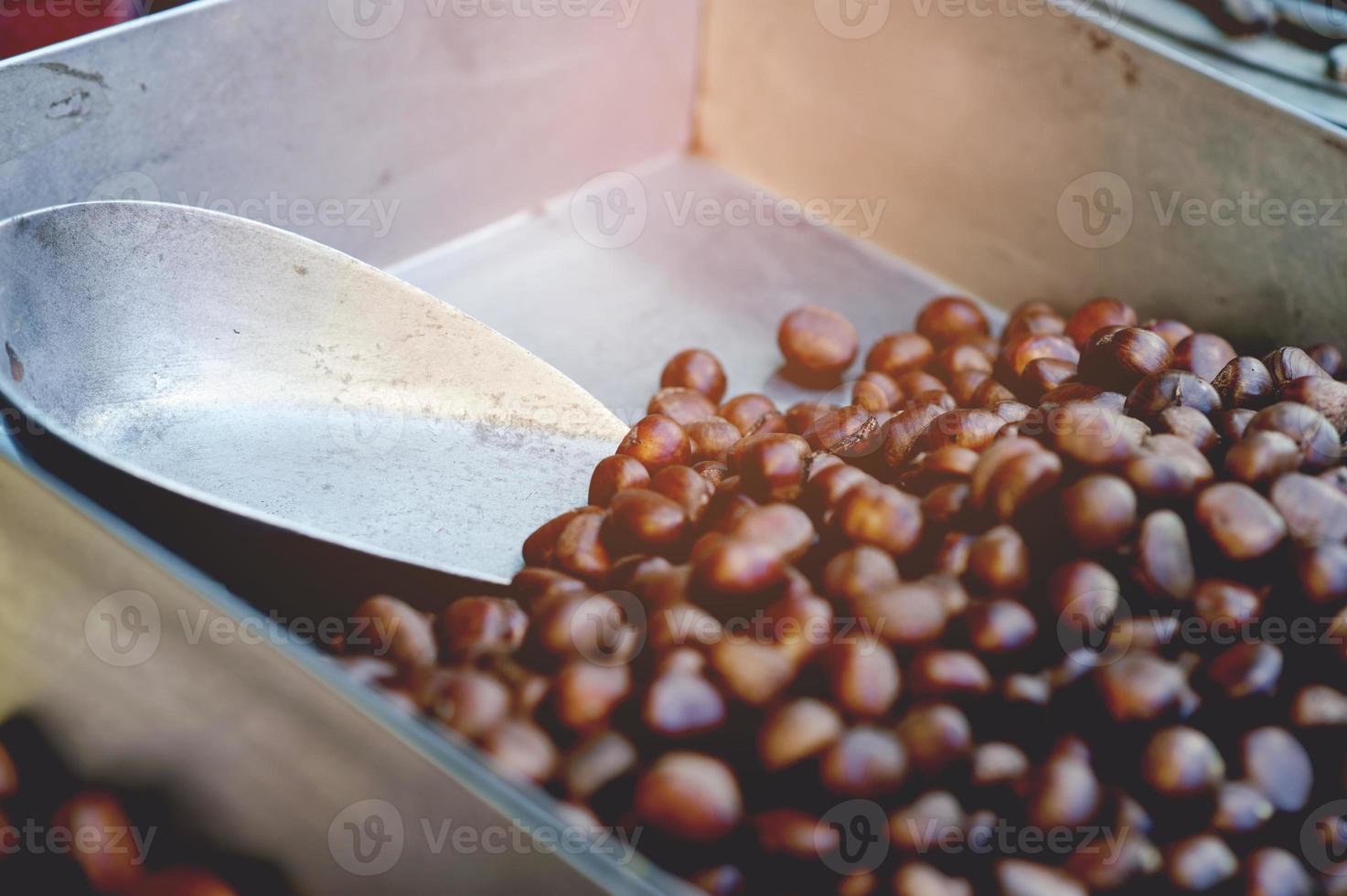 castanhas assadas, aroma doce, cheiro de café o conceito de comer comida que é útil com espaço de cópia foto