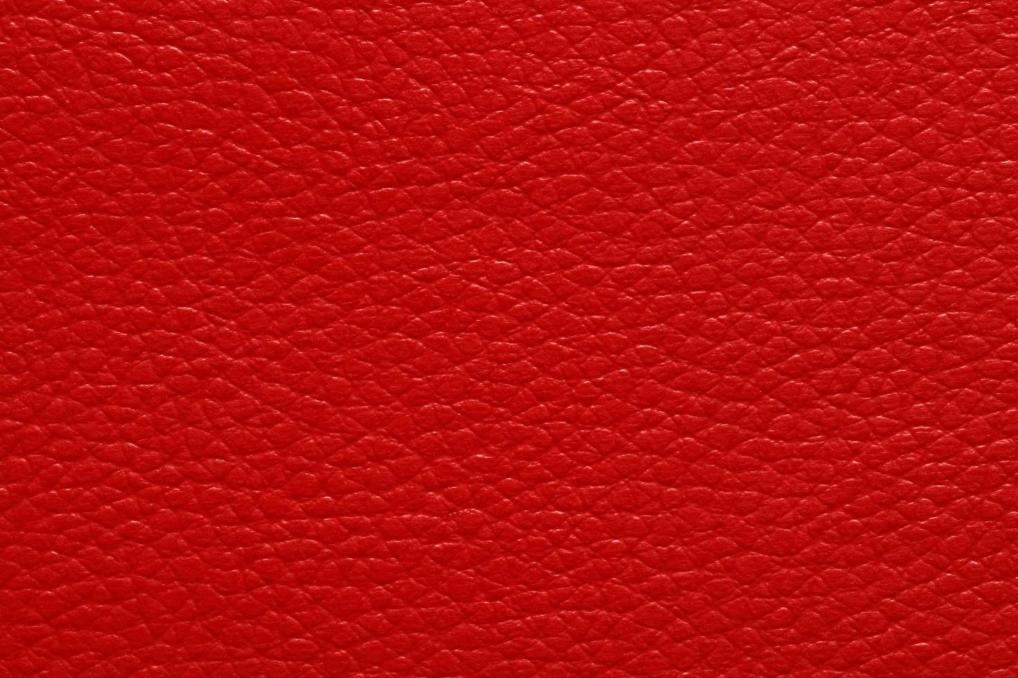 folha de couro vermelho brilhante, fundo de textura padrão abstrato foto