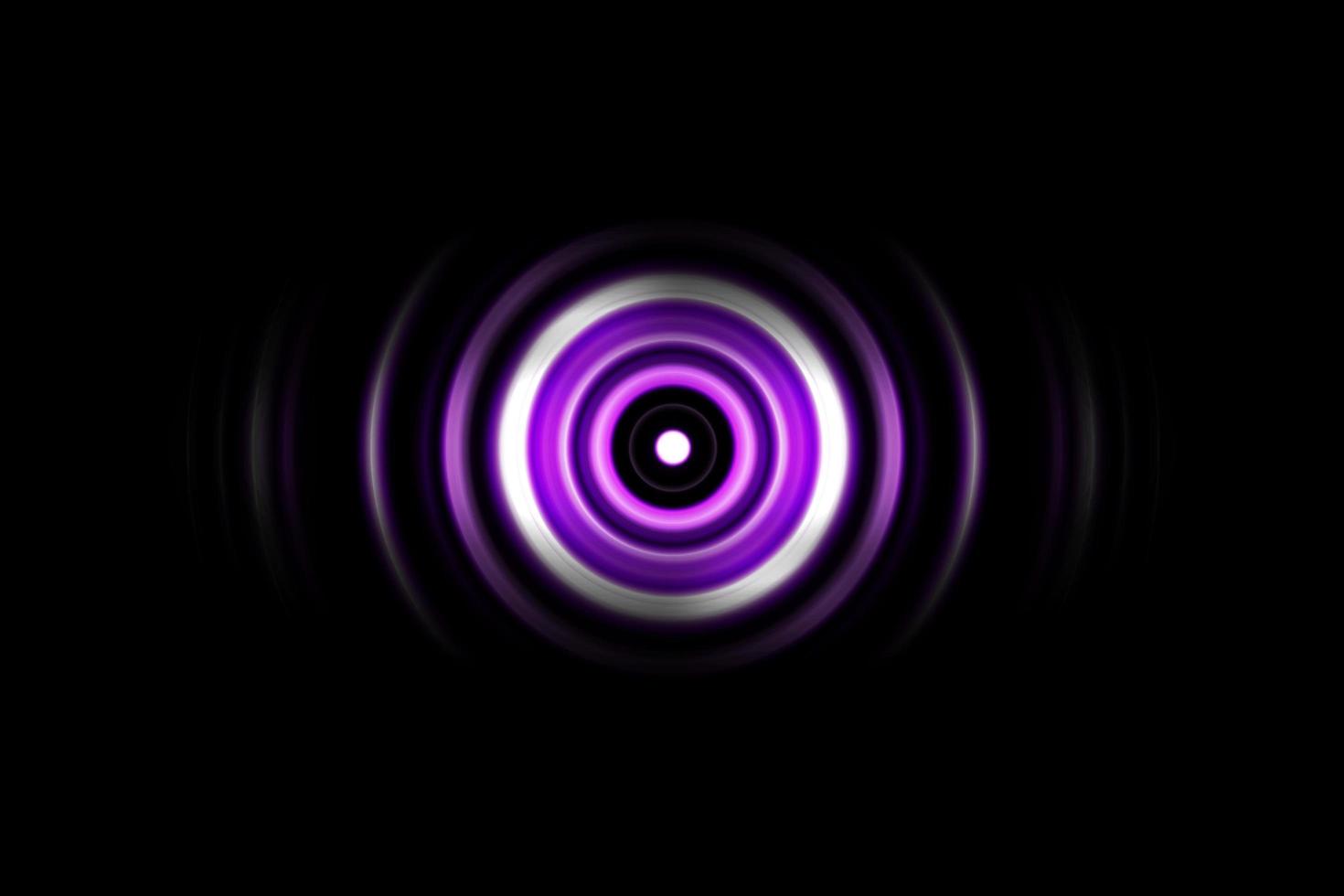 ondas sonoras oscilando a luz roxa com fundo abstrato de rotação do círculo foto