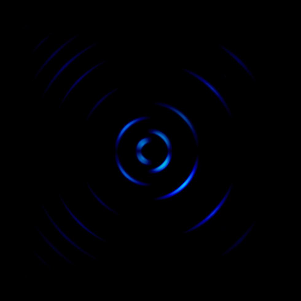 sinal de rotação azul abstrato em fundo preto foto