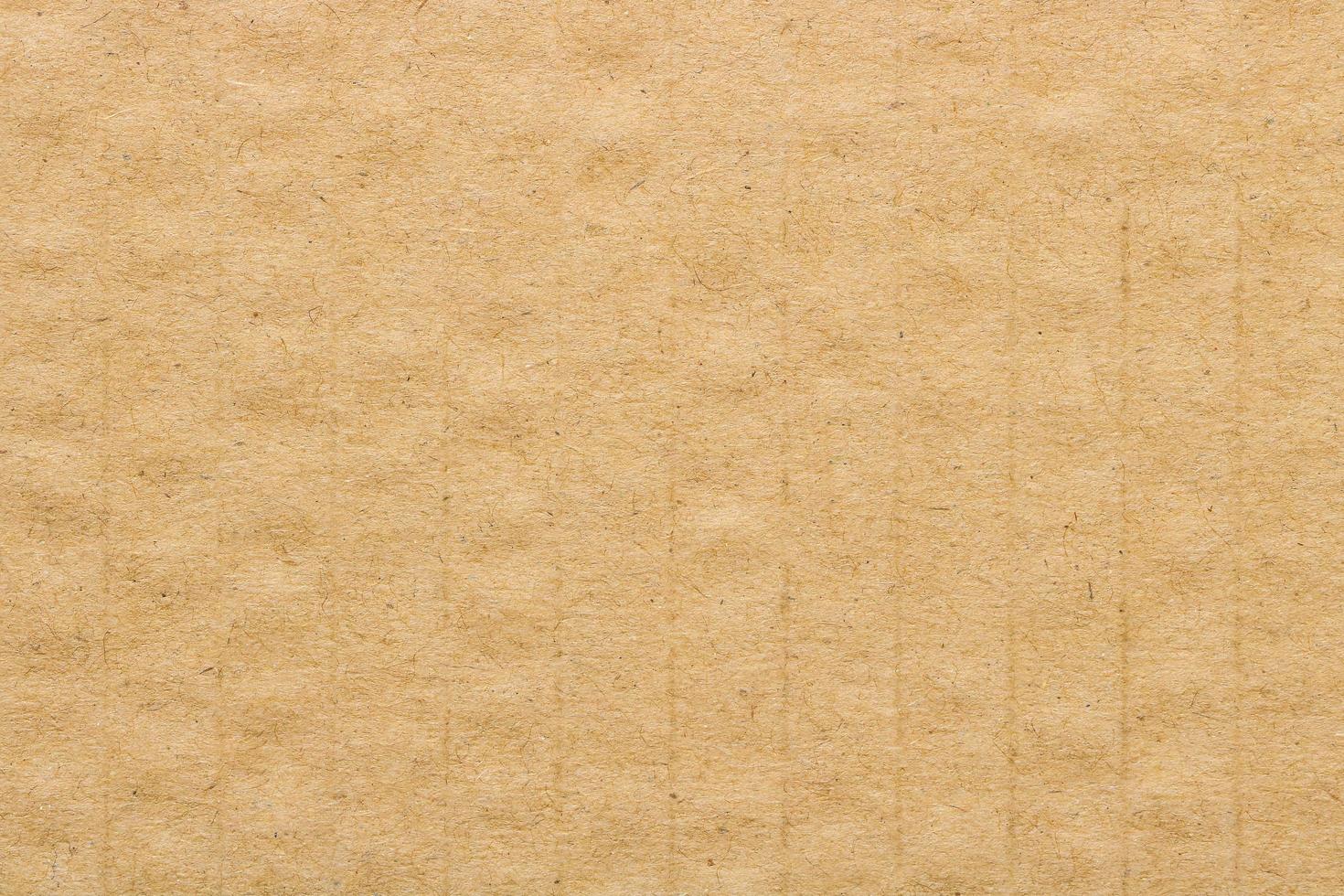 textura de papelão marrom, fundo de caixa de papel. foto