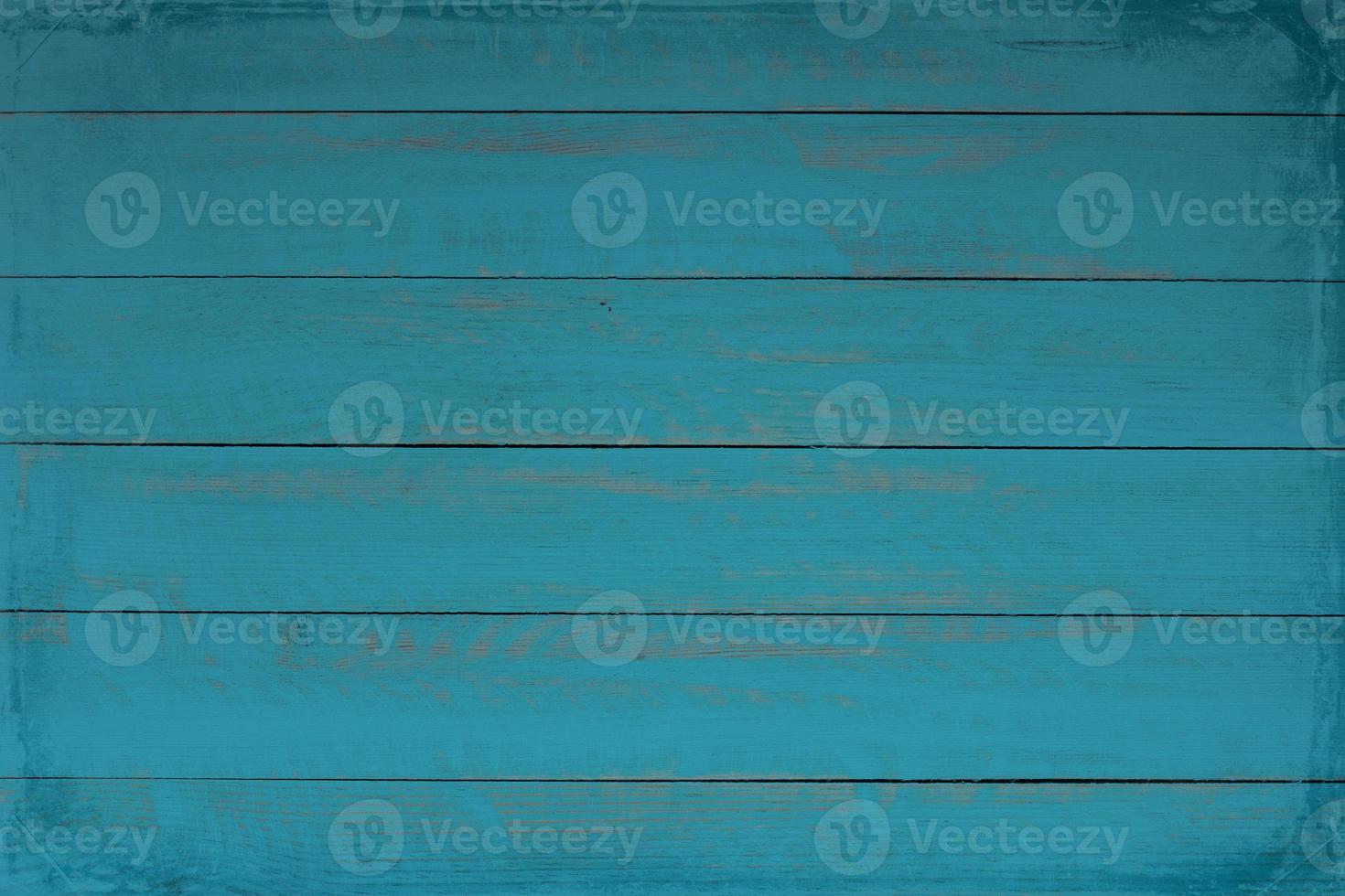 textura de fundo de madeira azul vintage com nós e furos de prego. parede de madeira pintada velha. abstrato azul. placas horizontais azuis escuras de madeira vintage. foto