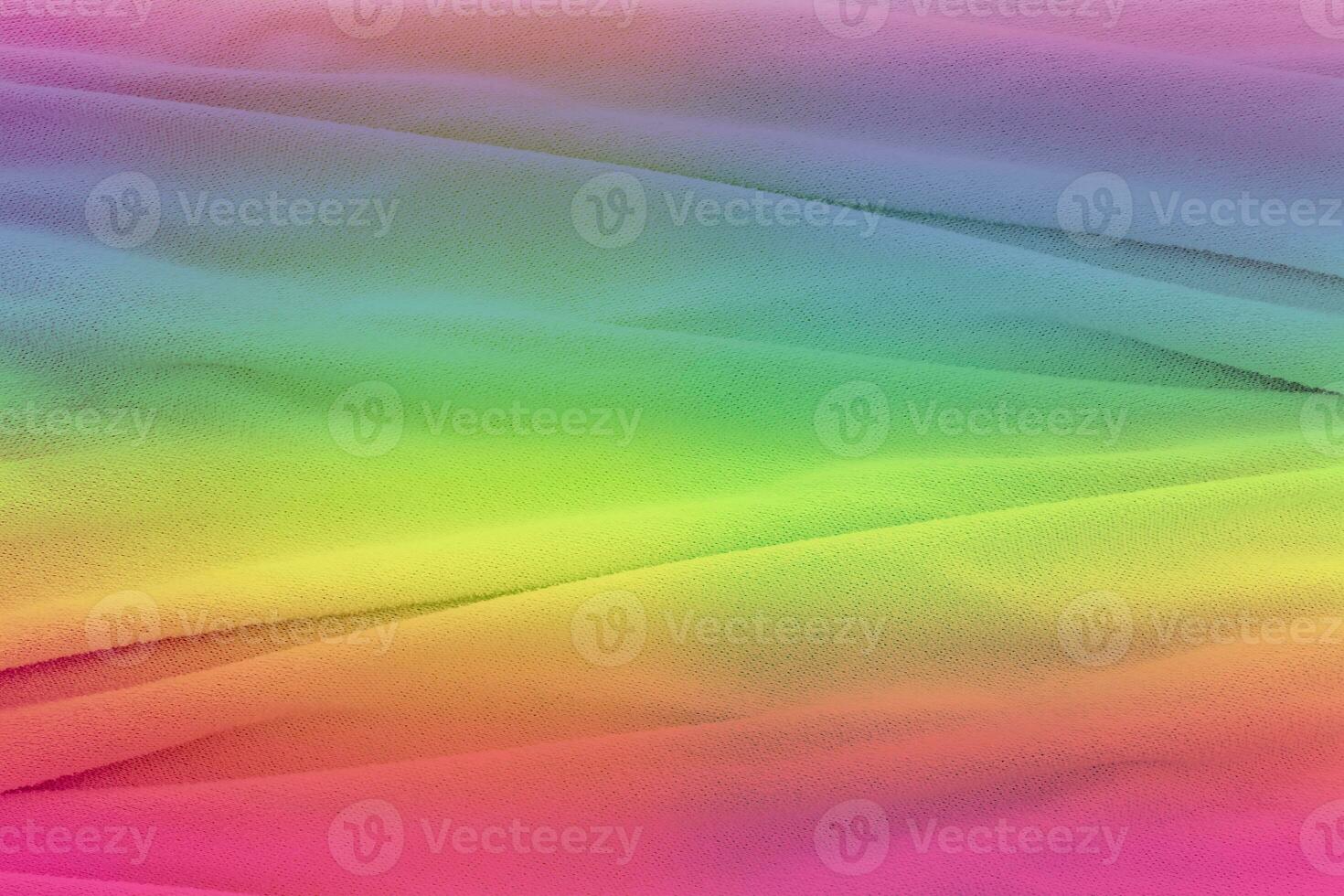 tecido macio na cor arco-íris. fundo de textura de pano multicolorido foto