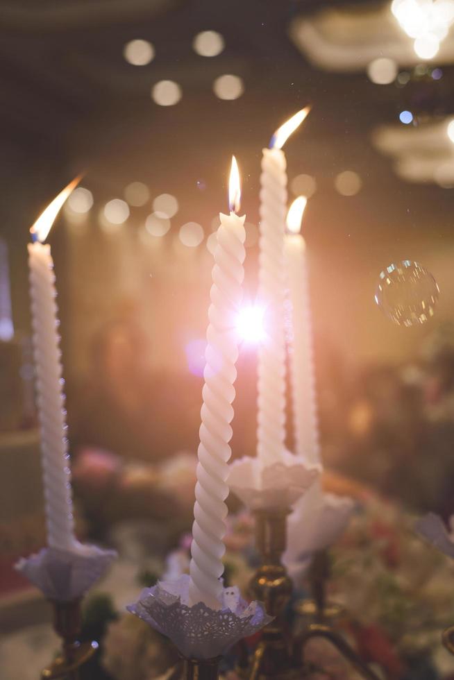 vela para cerimônia de casamento em festa de casamento foto