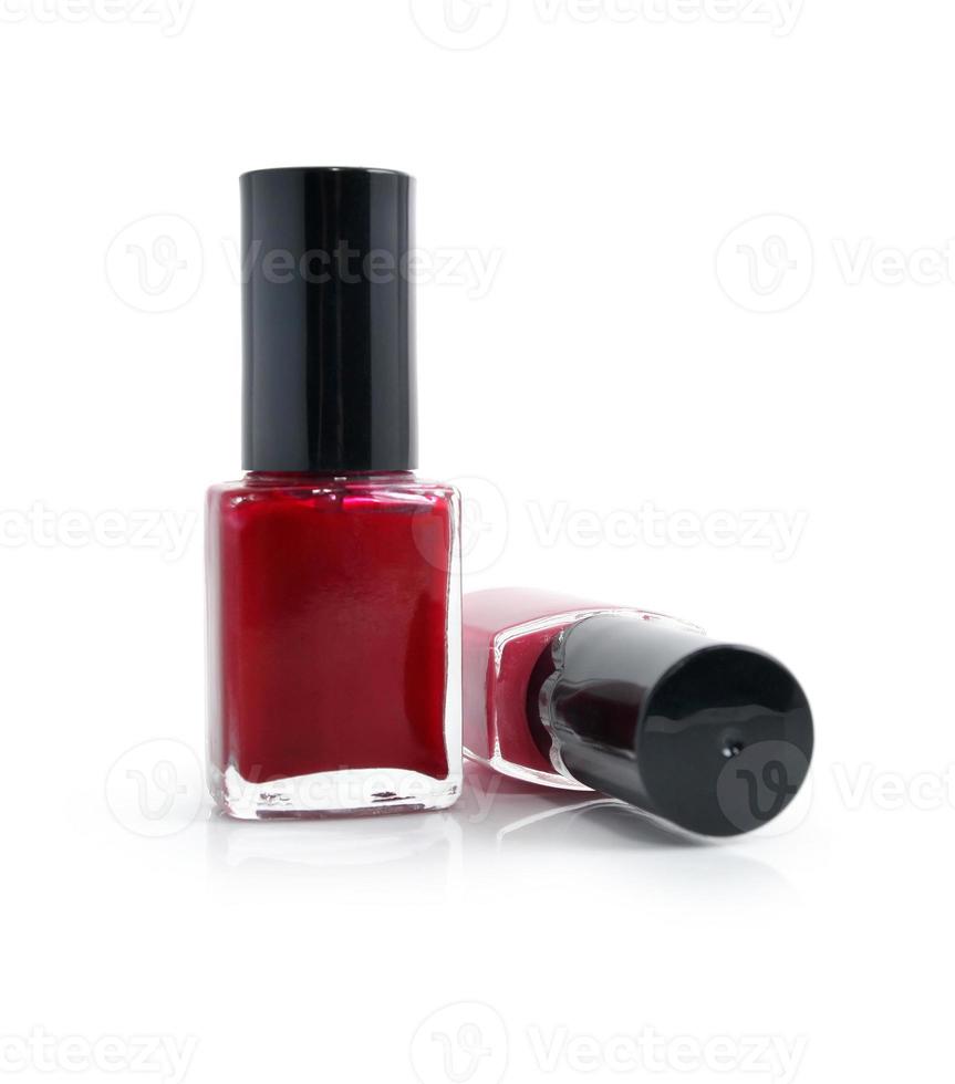 garrafas com esmalte vermelho isolado foto