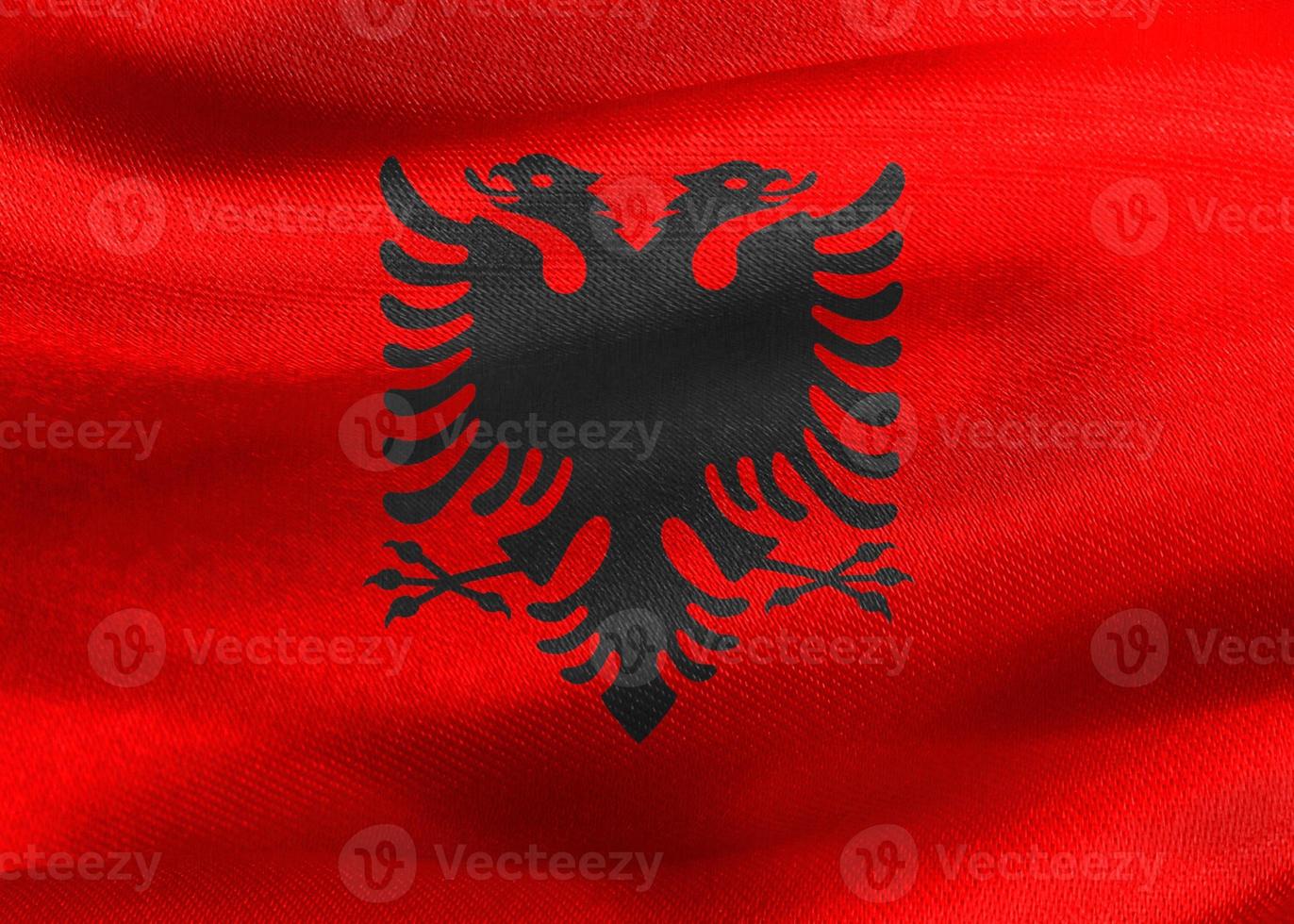 bandeira da albânia - bandeira de tecido acenando realista foto