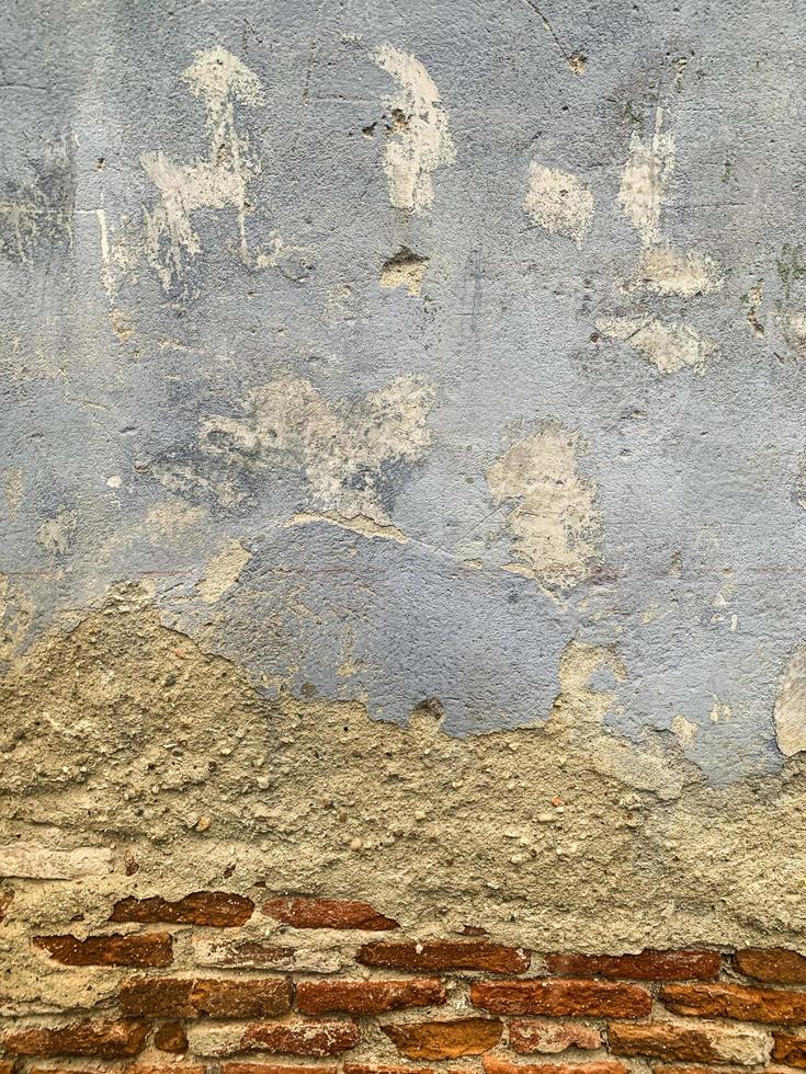 fundo de parede de tijolo velho. textura da parede de tijolos foto