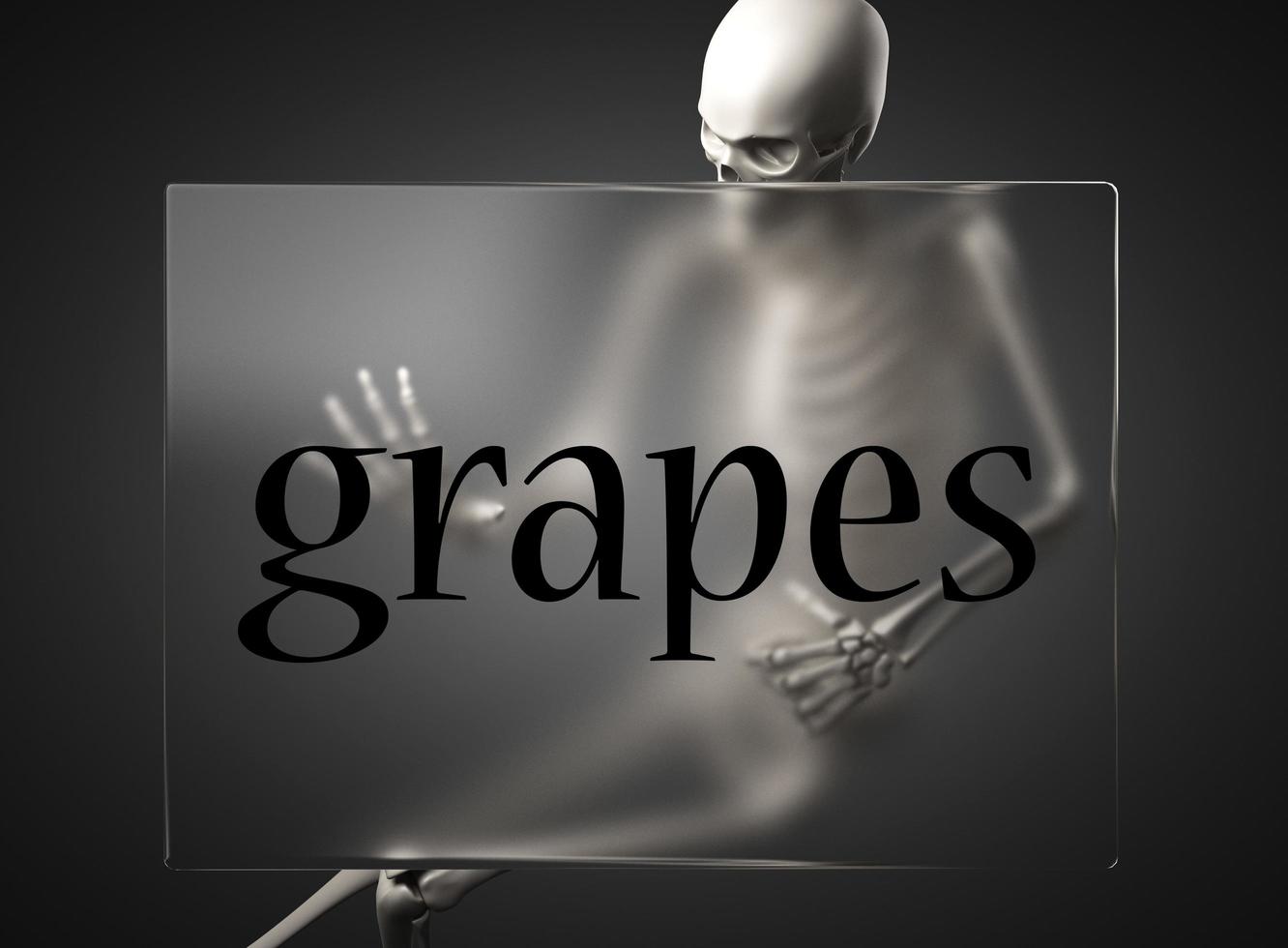 palavra de uvas em vidro e esqueleto foto
