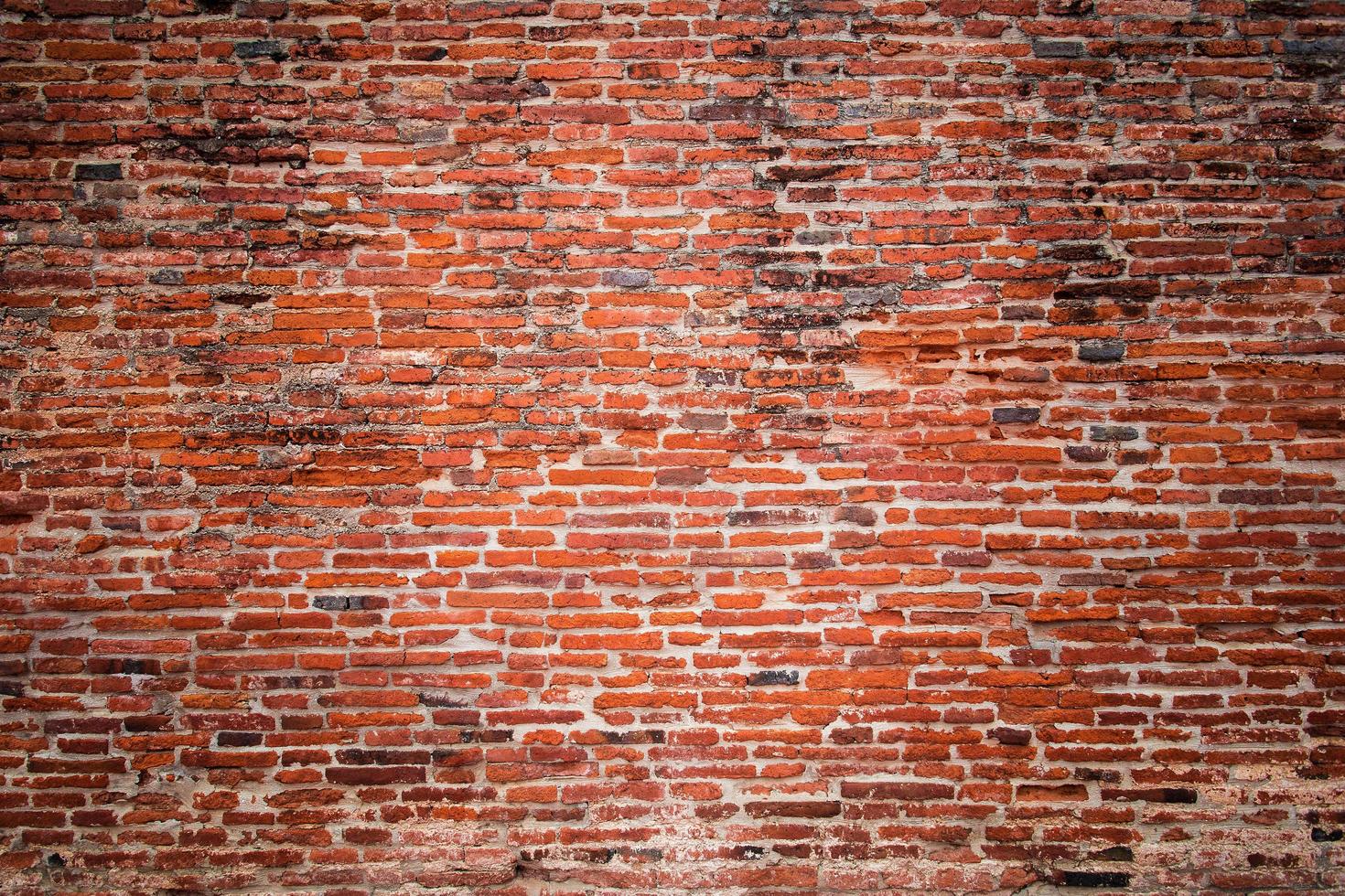 fundo de parede de tijolo velho foto