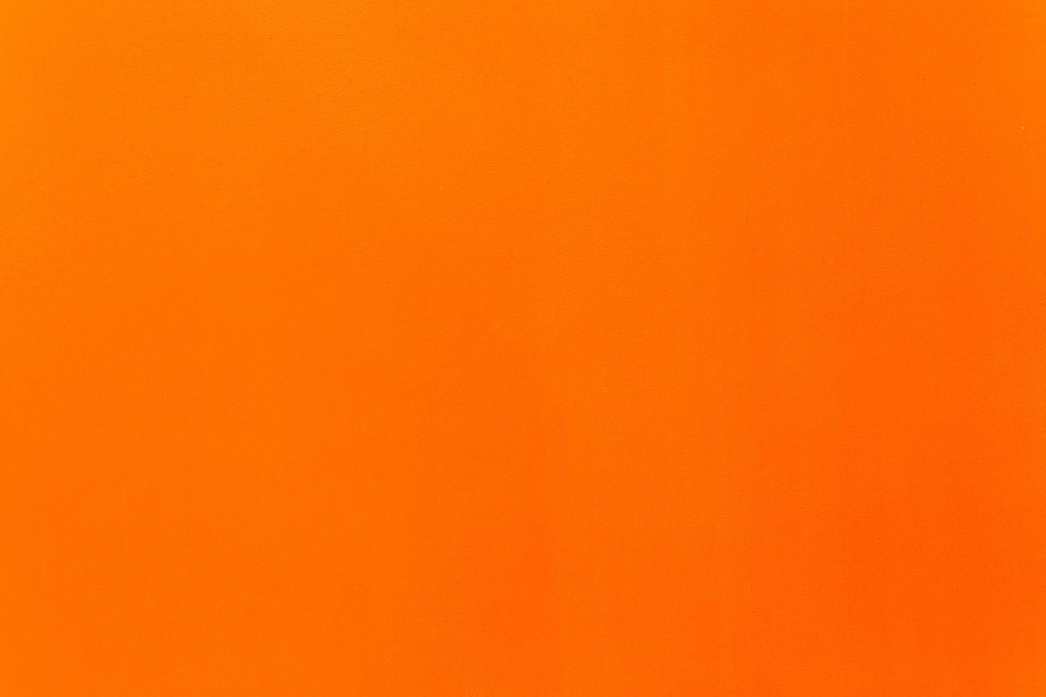 fundo de textura de parede laranja com espaço livre foto