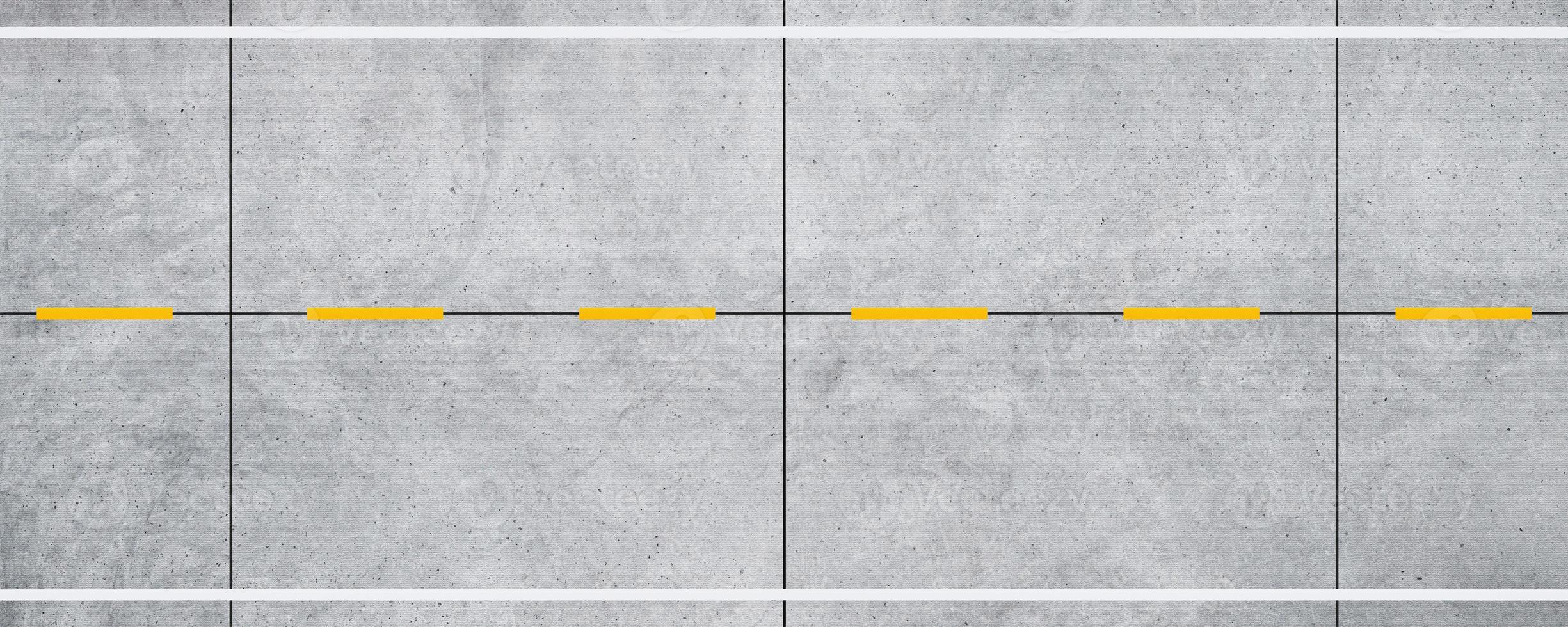 vista superior estrada de concreto vazia e fundo de linhas divisórias brancas e amarelas. foto