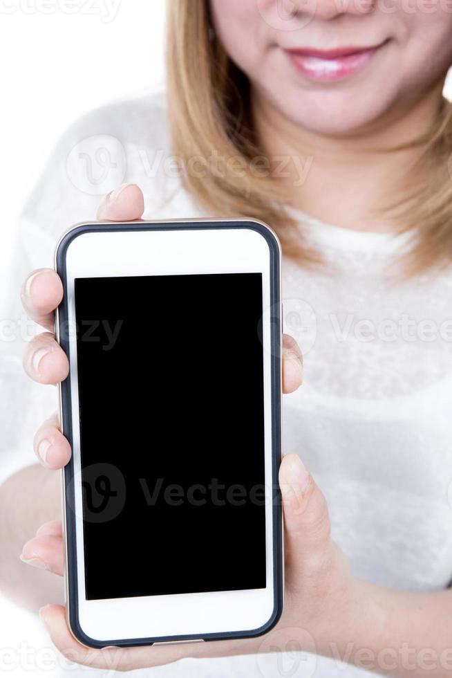mãos femininas isoladas, segurando o telefone foto