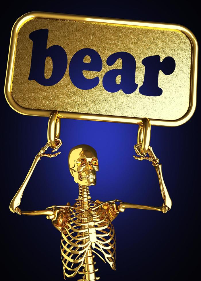 palavra de urso e esqueleto dourado foto