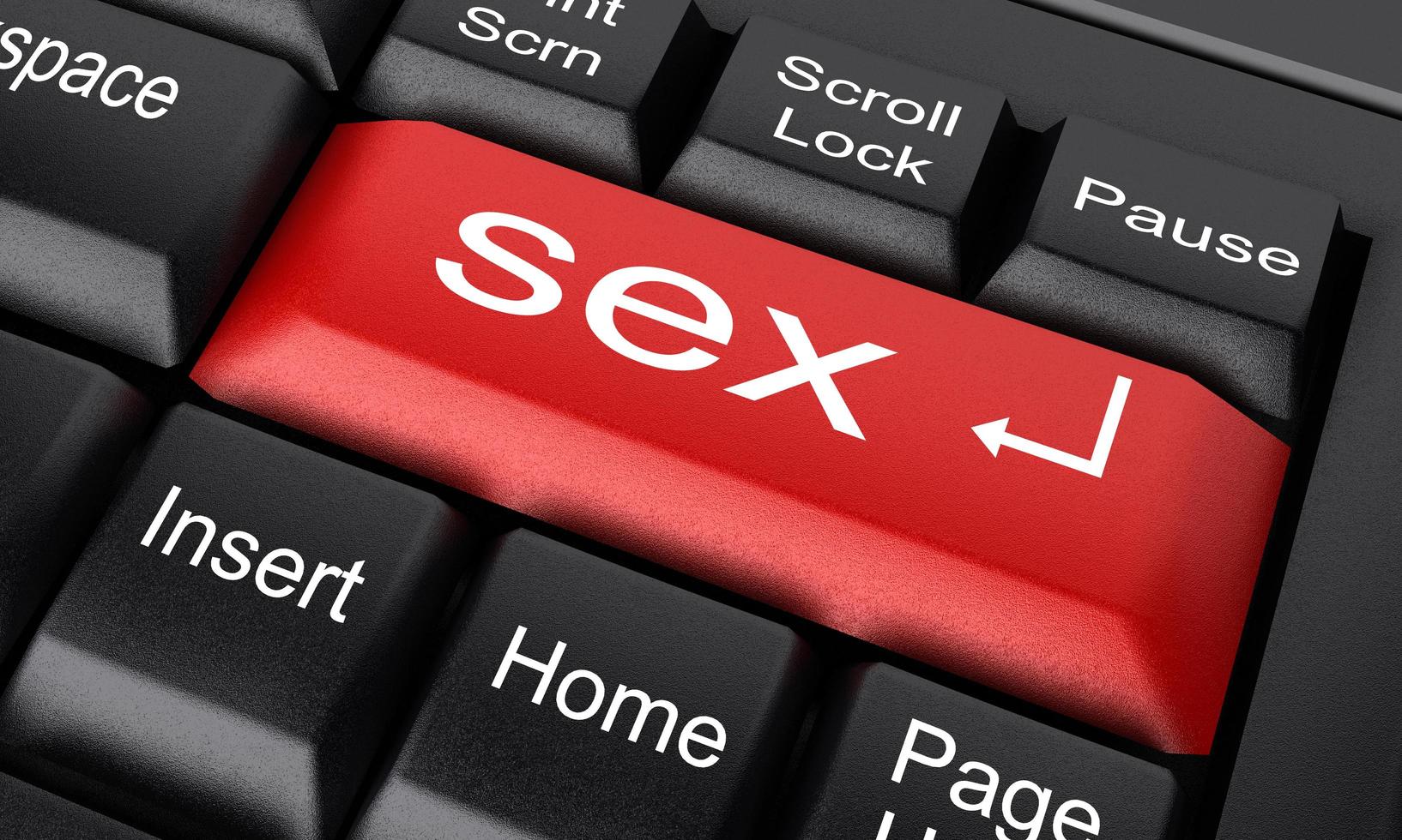 palavra de sexo no botão vermelho do teclado foto