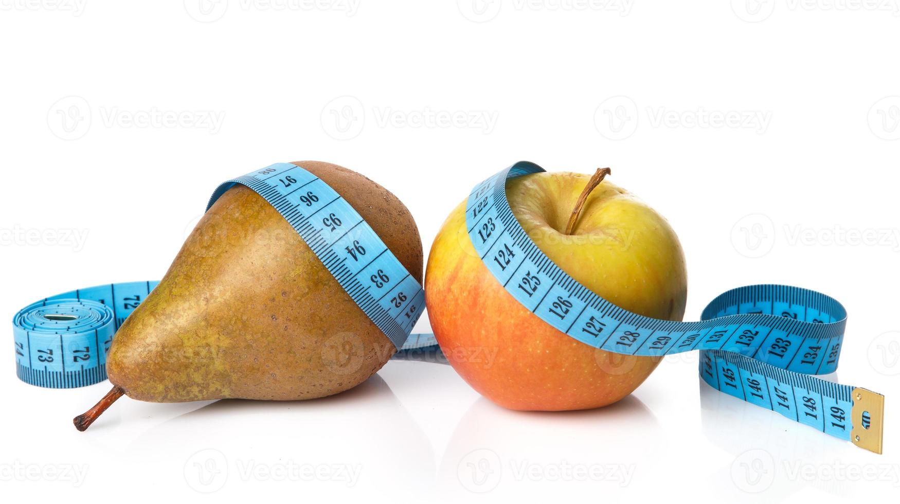 frutas e fita métrica foto