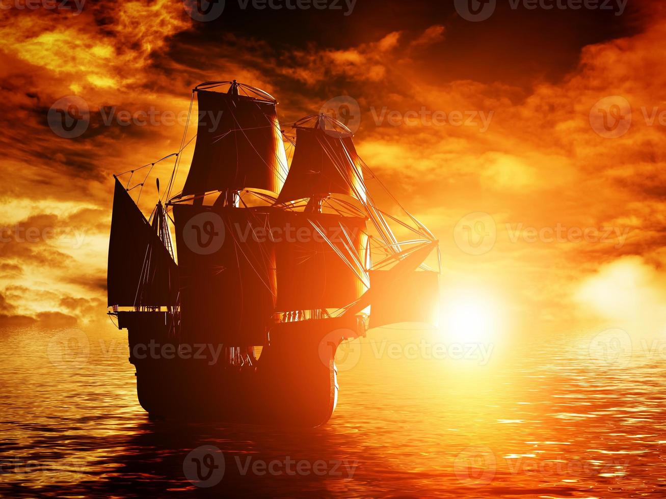 antigo navio pirata navegando no oceano ao pôr do sol foto