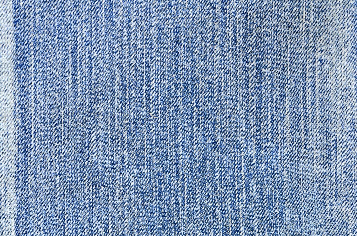 textura de jeans azul padrão de moda de fundo jeans foto