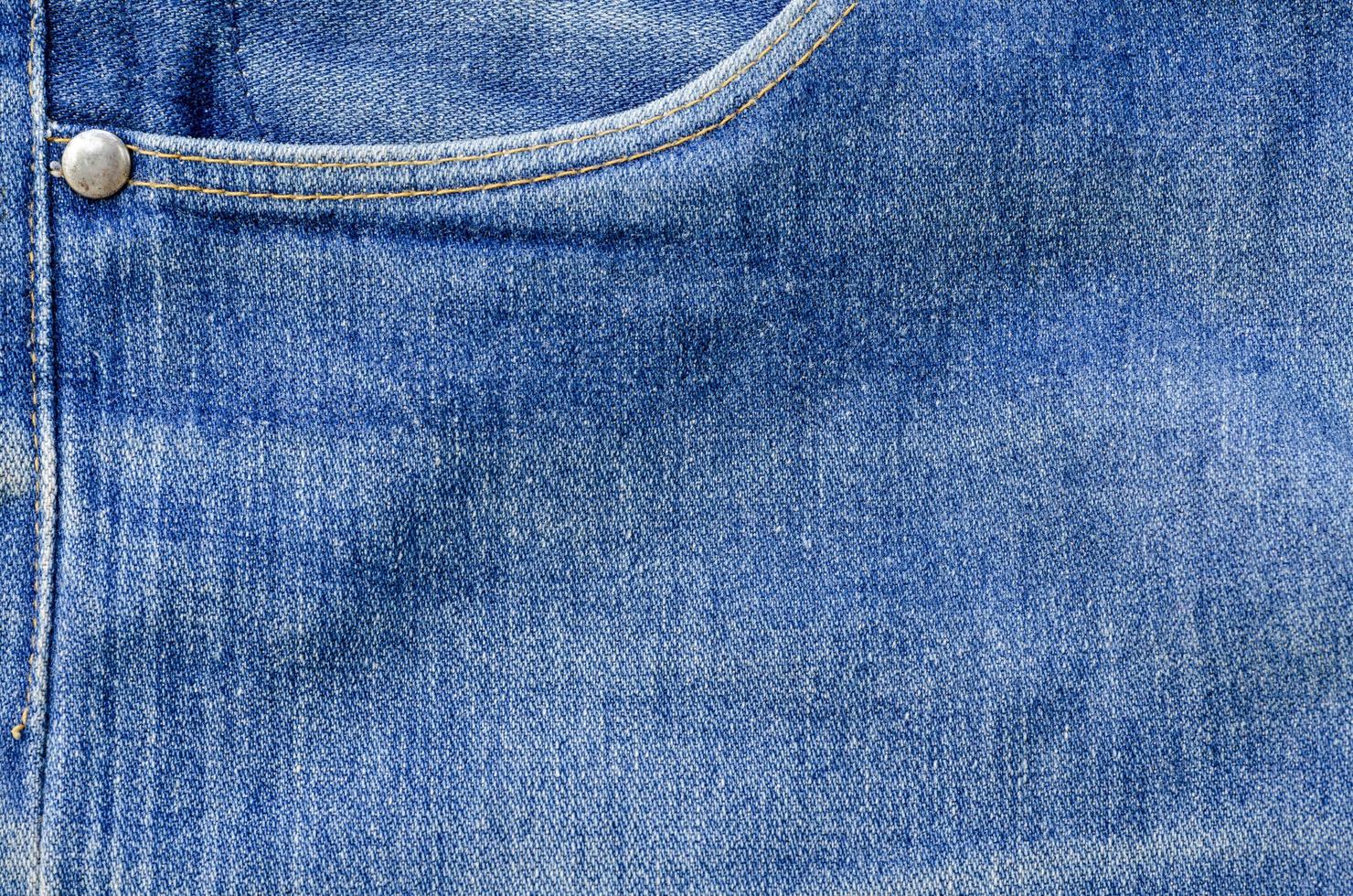 textura de jeans azul padrão de moda de fundo jeans foto