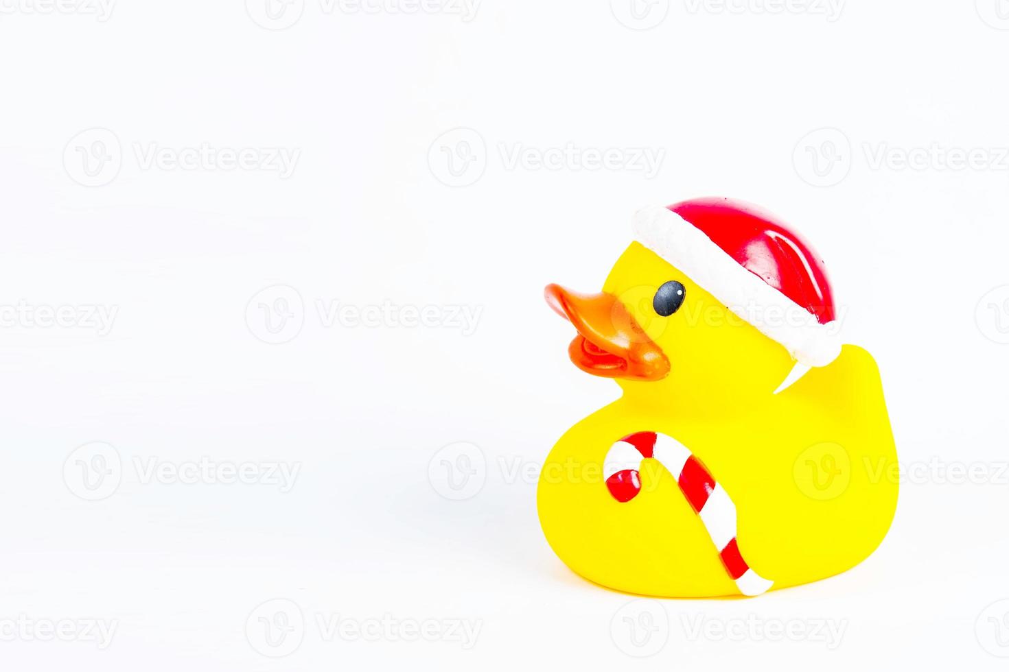 pato de banho no fundo branco brinquedo de pato pato de borracha fofo foto