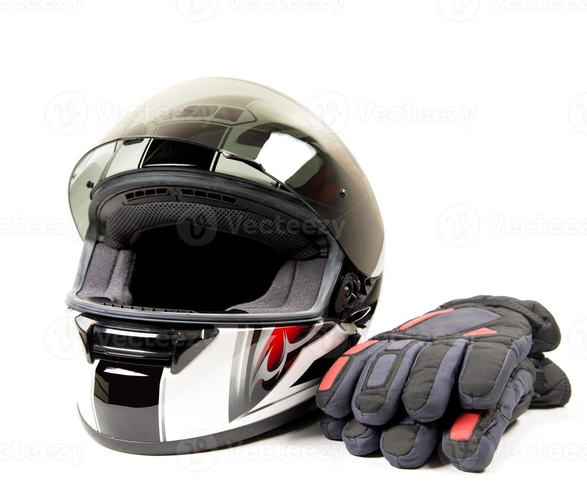 capacete e luva de motocicleta foto