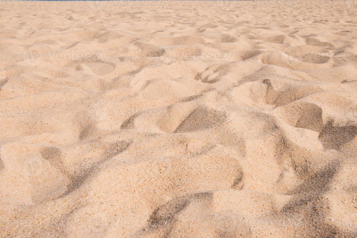padrão de textura de areia fundo arenoso de praia foto