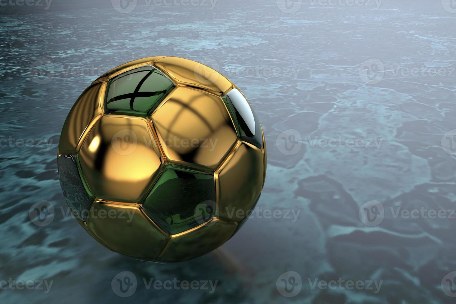 bola de futebol 3d feita de ouro com inserções de vidro verde foto