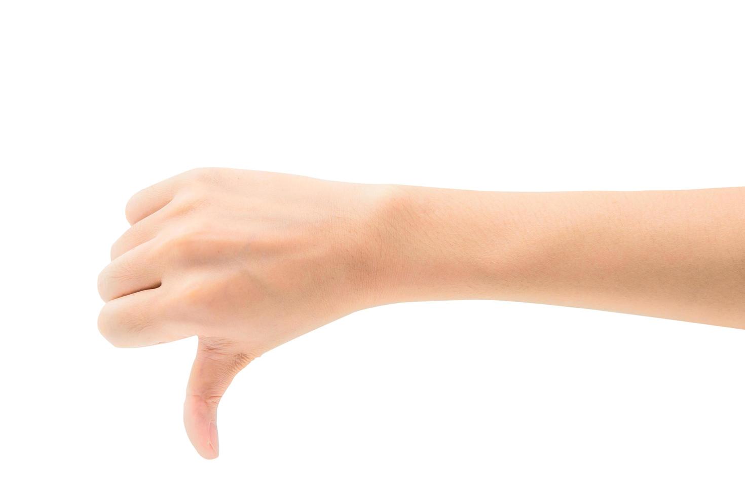 mão de mulher mostra golpe para baixo isolado no fundo branco com traçado de recorte foto