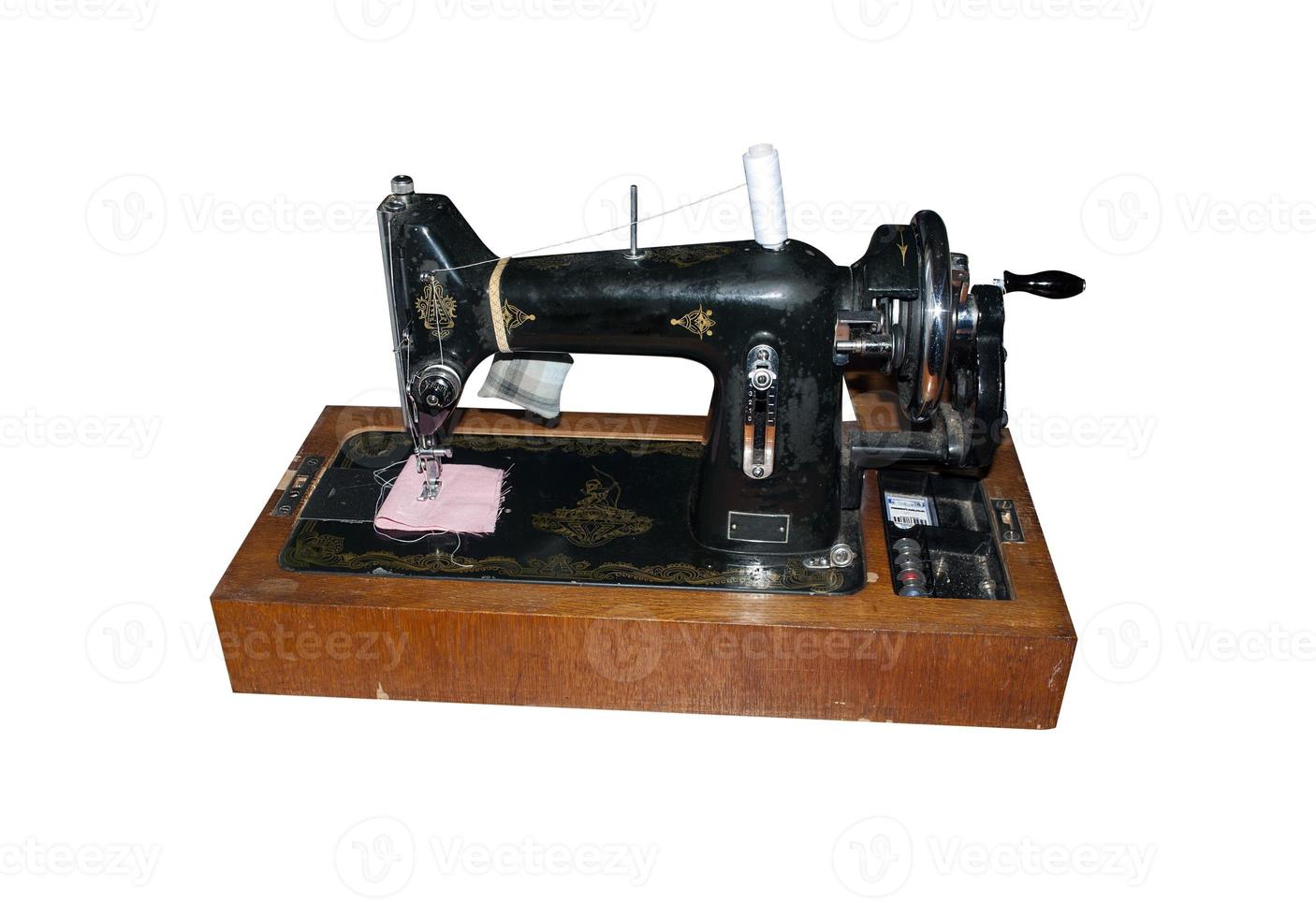maquina de costura manual antiga foto