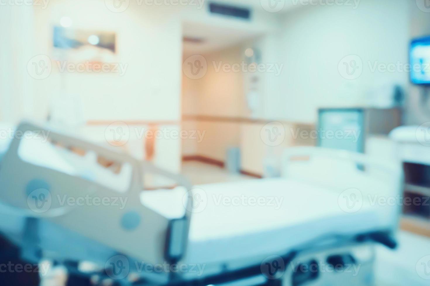 Resumo borrão interior do quarto de hospital com cama médica para plano de fundo foto
