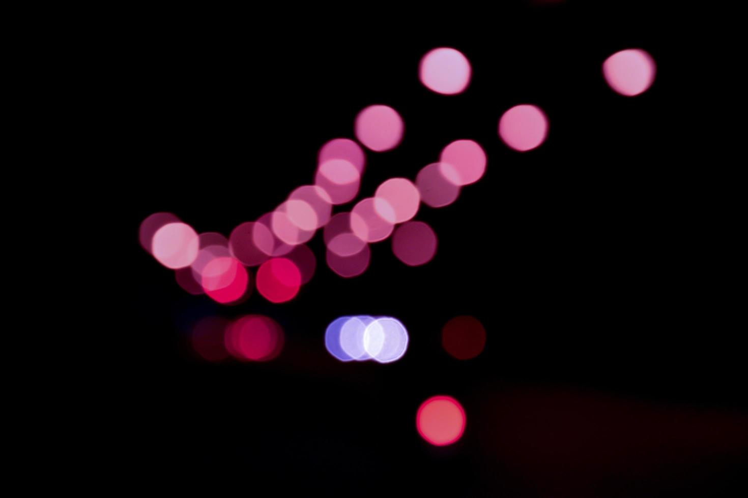 bokeh luz de rua à noite. foto