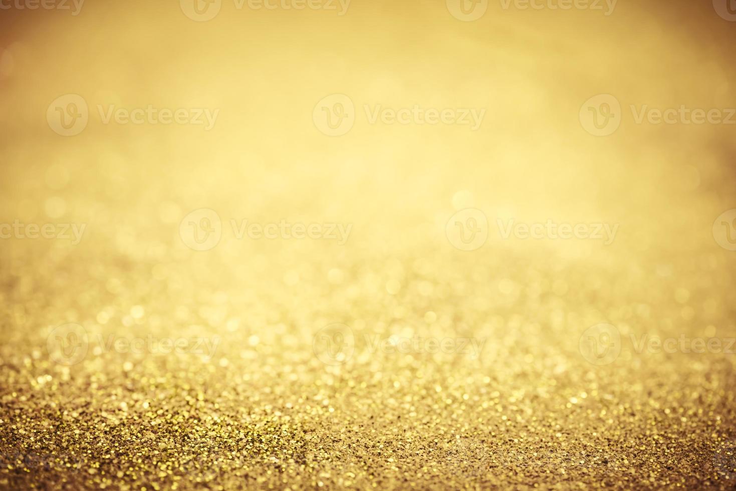 textura de iluminação de bokeh de brilho dourado turva fundo abstrato para aniversário, aniversário, casamento, véspera de ano novo ou natal foto