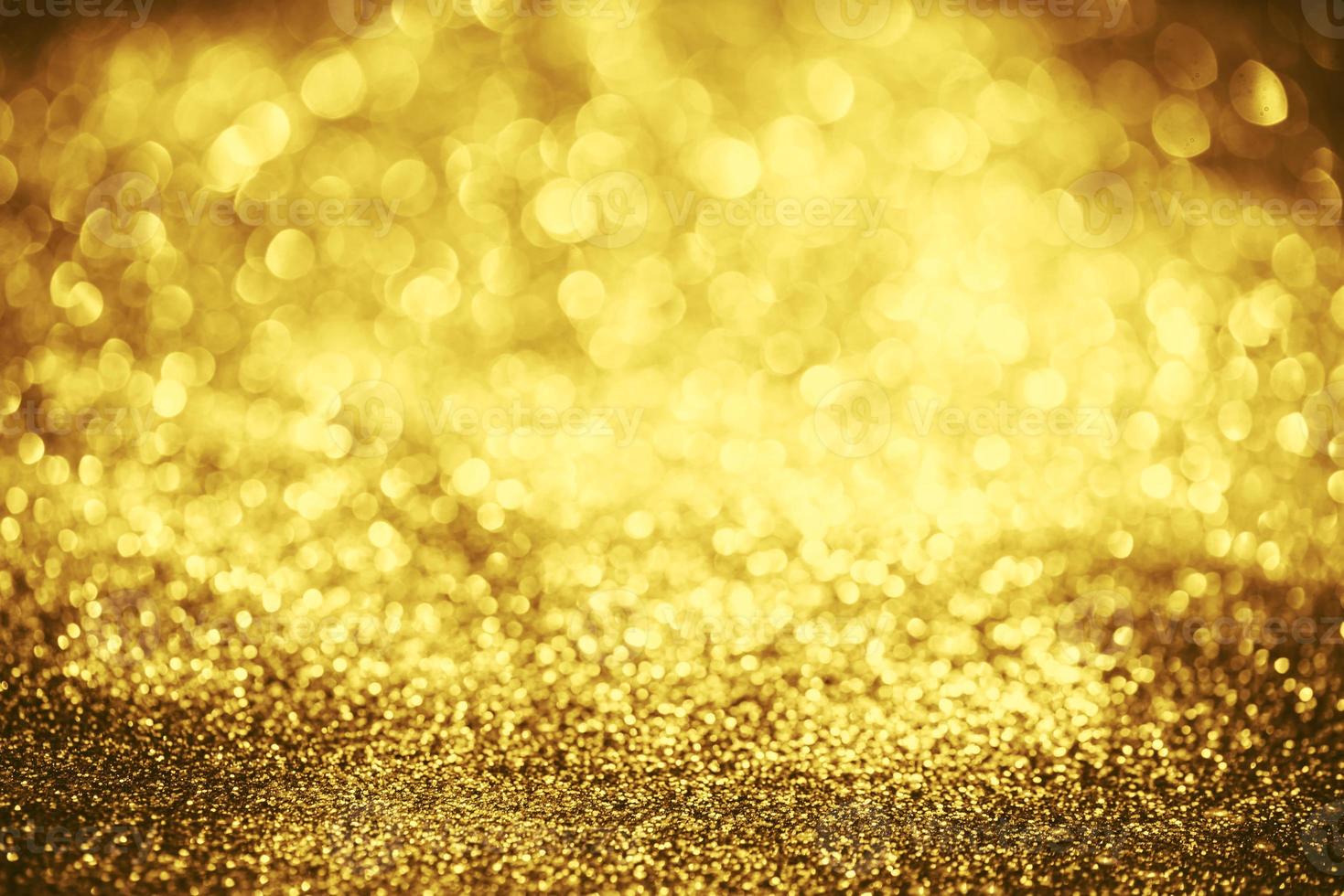 textura de iluminação de bokeh de brilho dourado turva fundo abstrato para aniversário, aniversário, casamento, véspera de ano novo ou natal foto