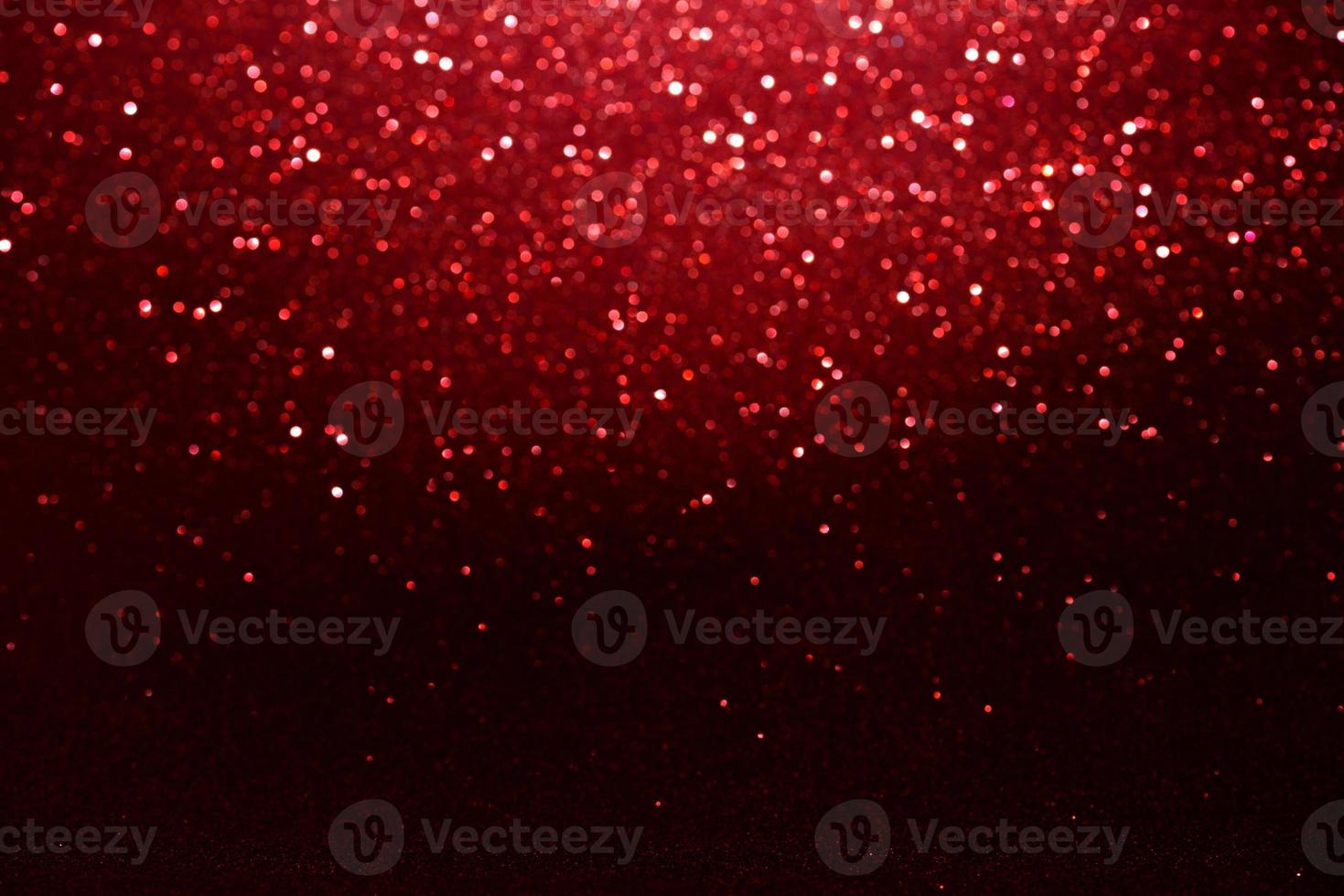 luzes de bokeh de glitter vermelho borraram fundo abstrato para dia dos namorados, aniversário, aniversário, casamento, ano novo e natal foto