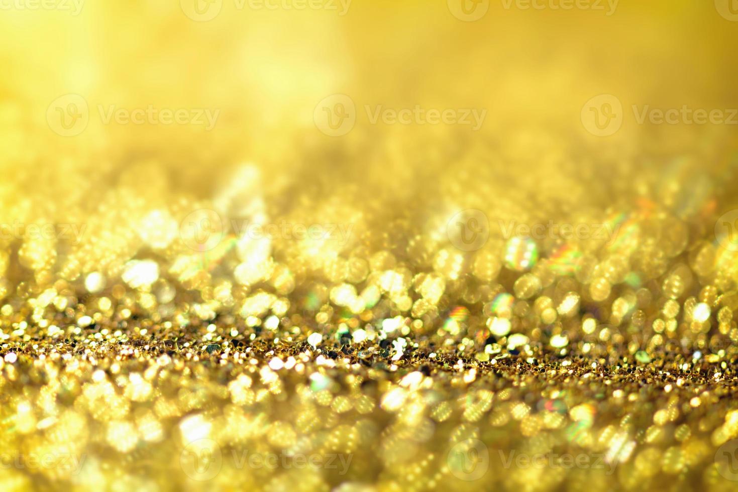 textura de iluminação de bokeh de brilho dourado turva fundo abstrato para aniversário, aniversário, casamento, véspera de ano novo ou natal foto