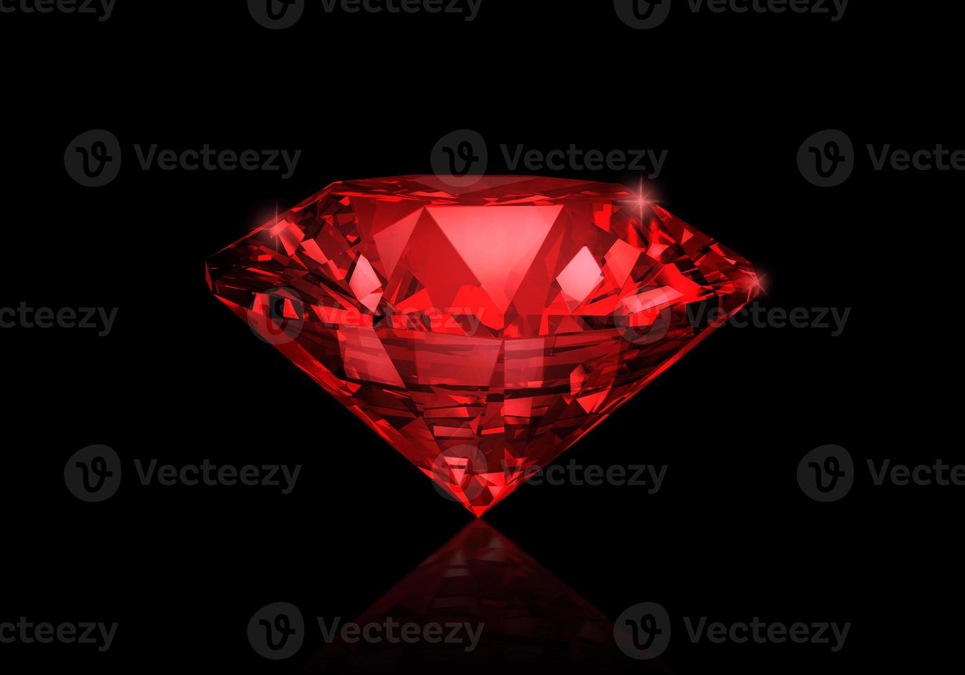 diamante vermelho sobre fundo preto foto