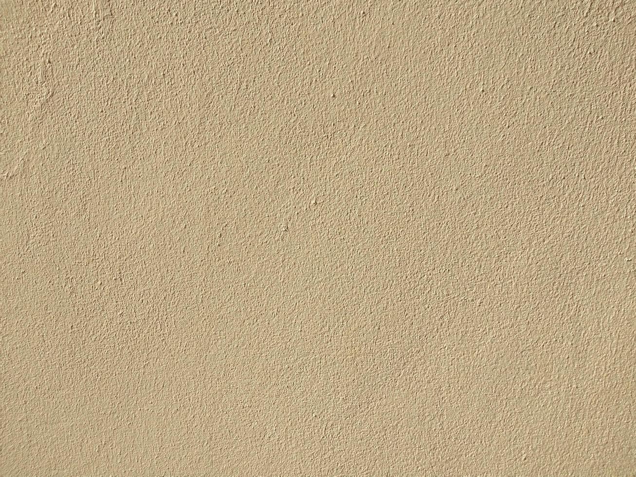 fundo de parede de concreto marrom claro fundo de textura áspera e papel de parede foto