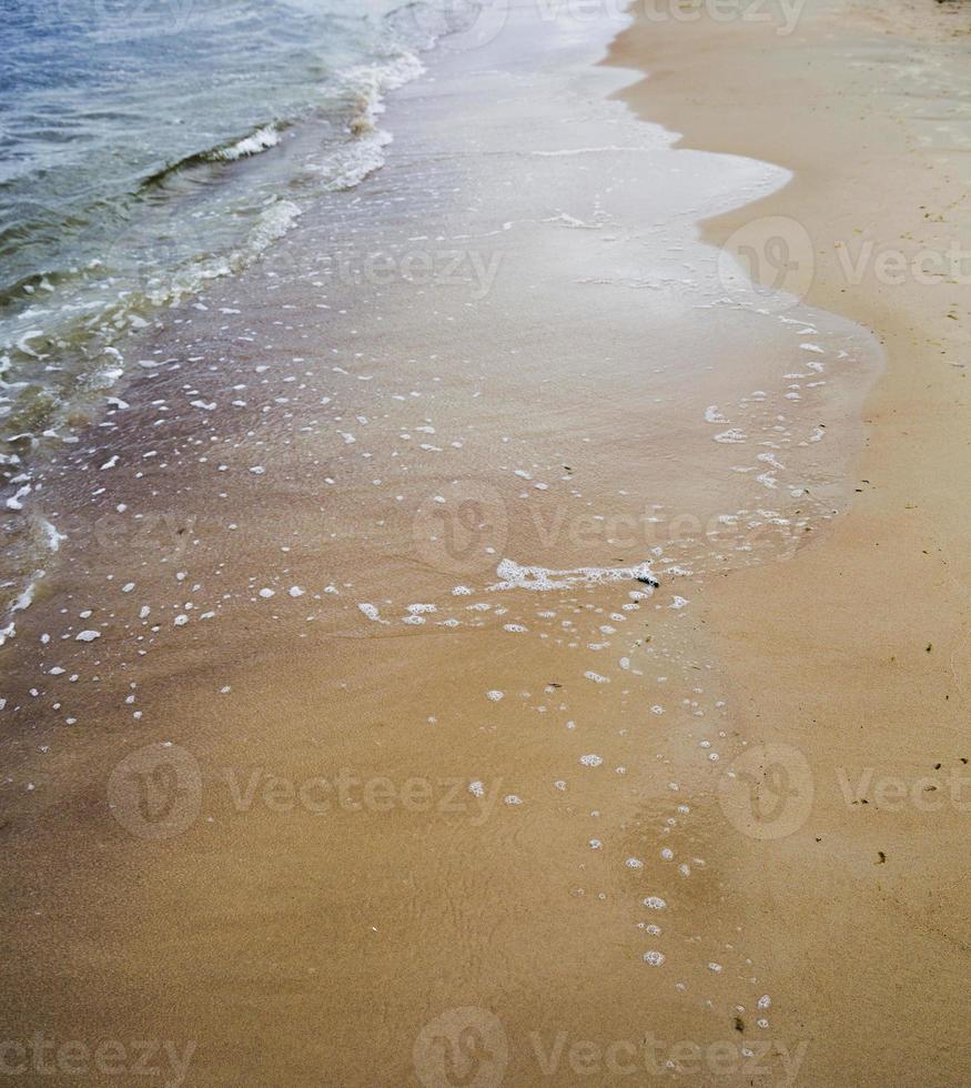 praia de areia do mar foto