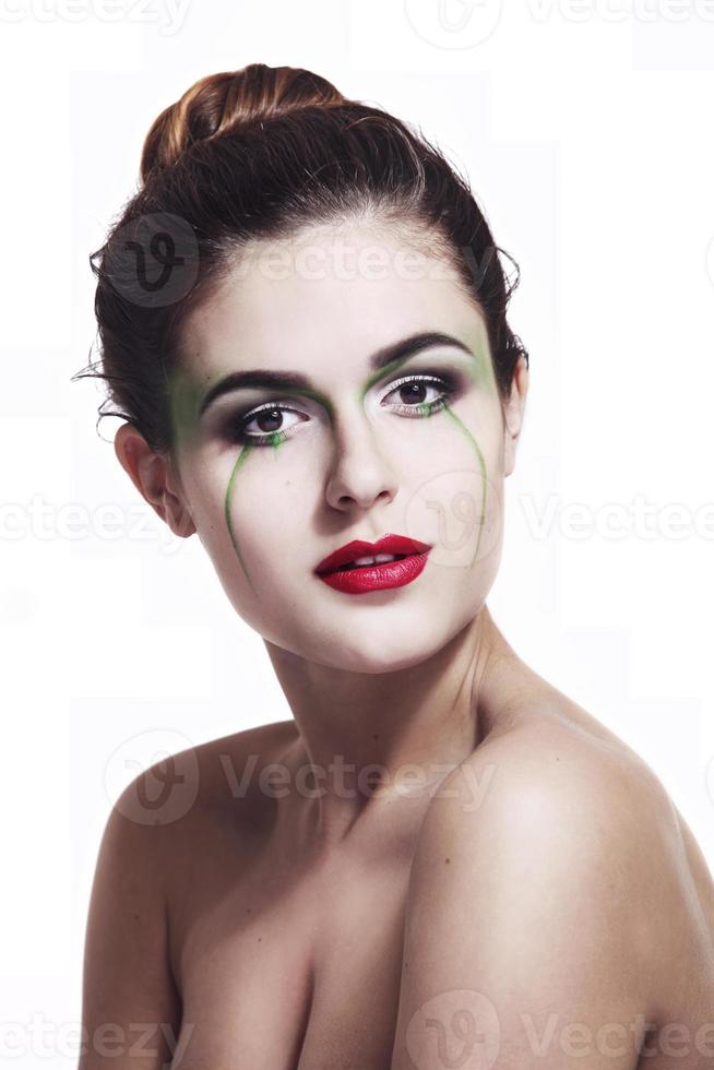 retrato de uma menina com maquiagem foto