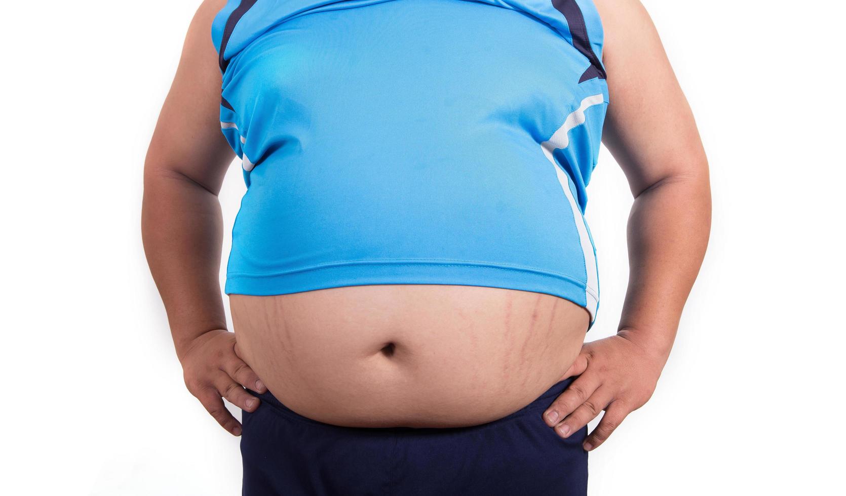 homem gordo com uma barriga grande. dieta foto