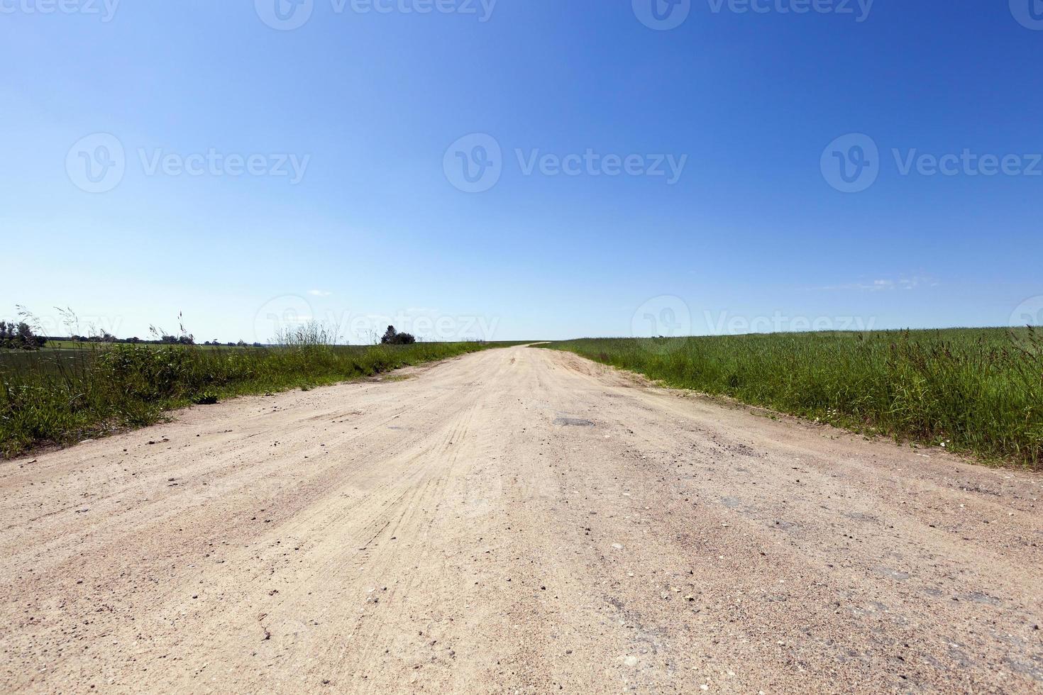 estrada de cascalho, campo foto