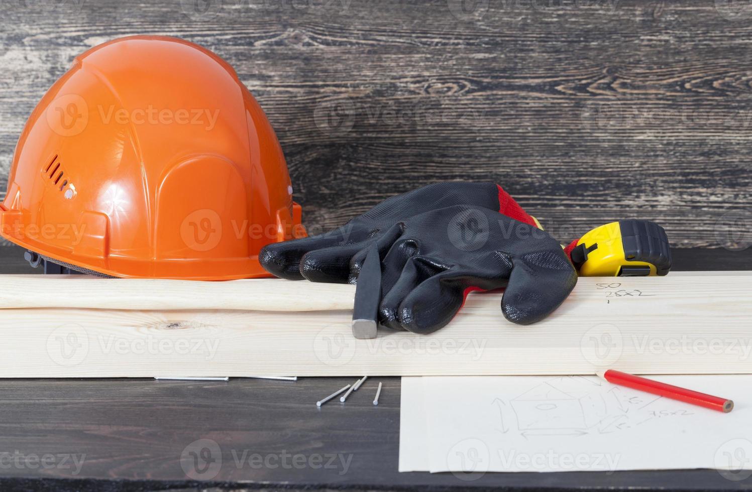 capacete de construção laranja foto