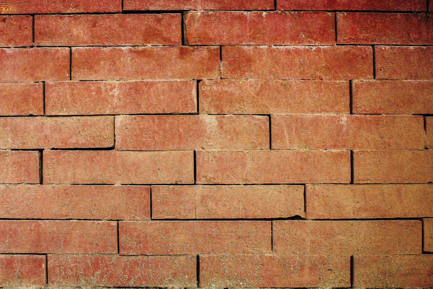 plano de fundo texturizado de parede de tijolo vermelho vazio foto