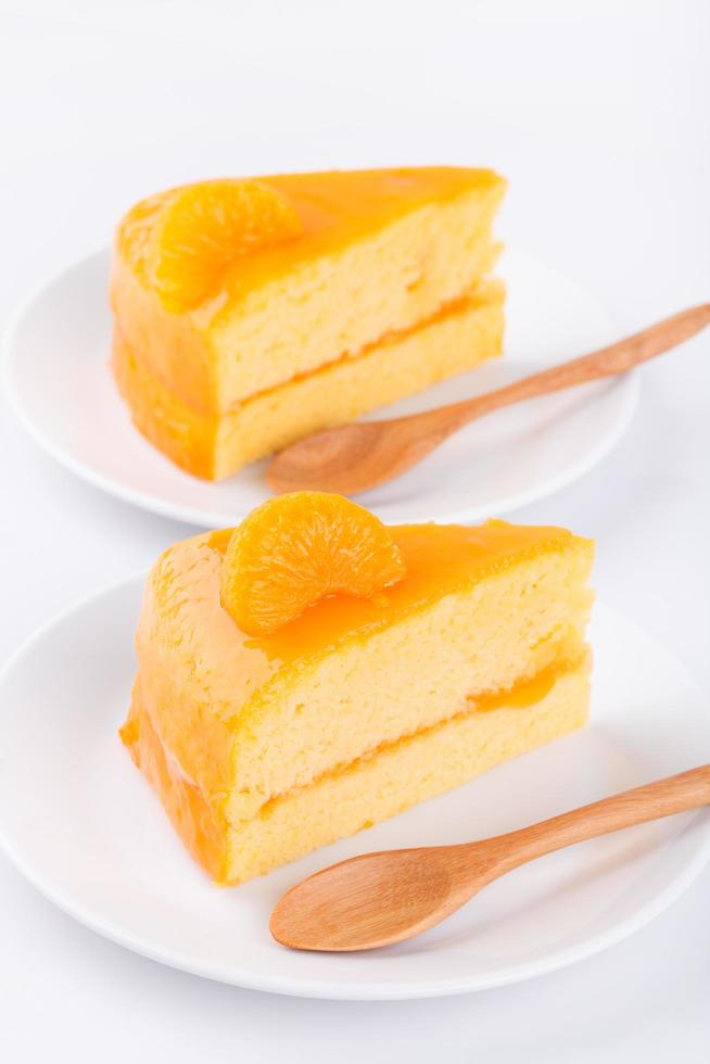 bolo de laranja e colher de pau foto