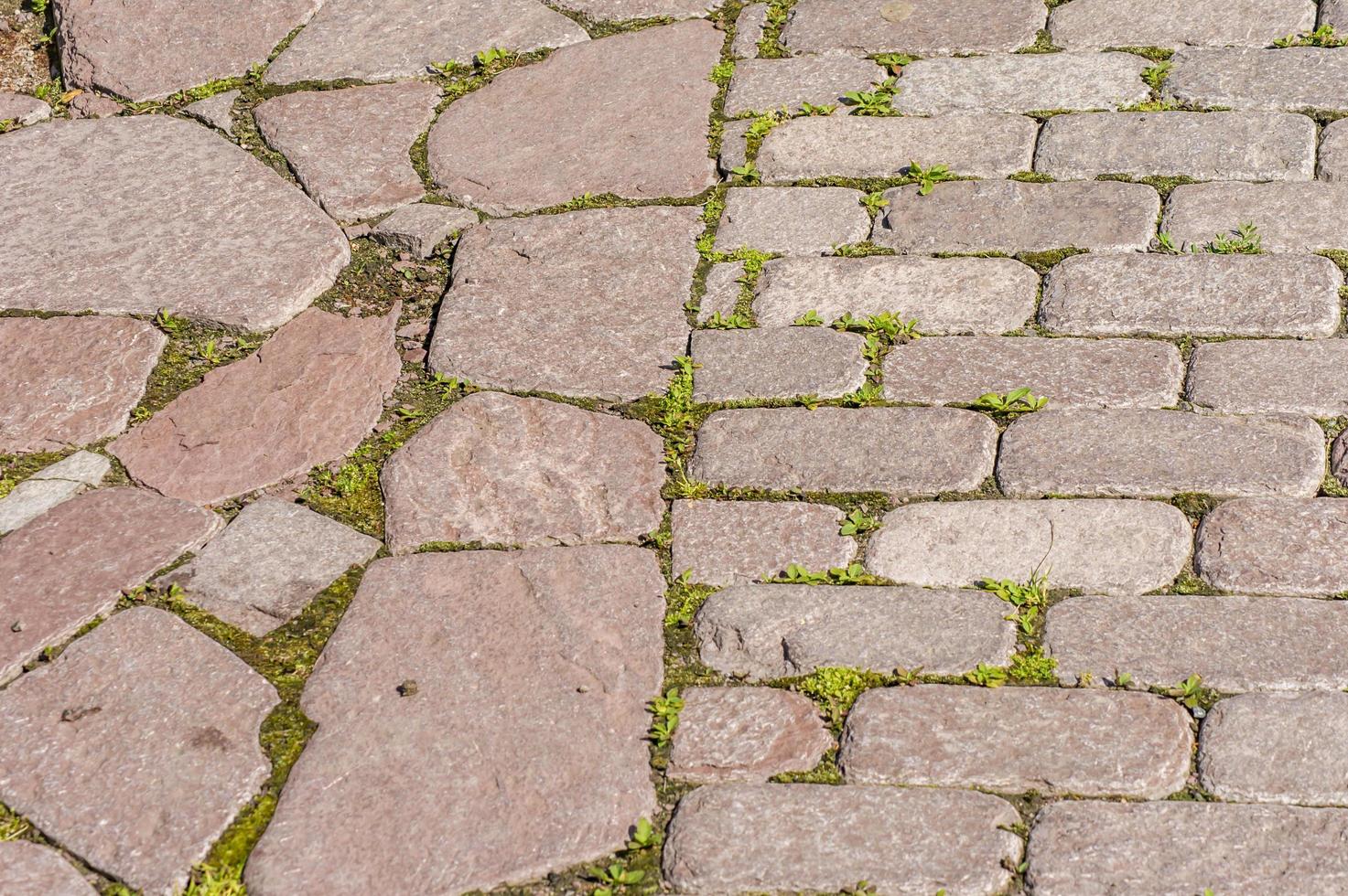 dois tipos de pedras de pavimento, textura de fundo foto