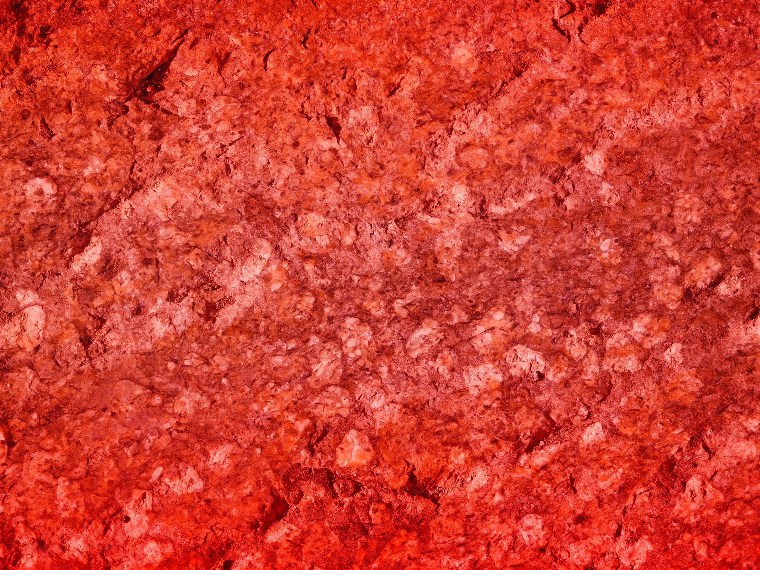 textura de pedra vermelha do lado de fora foto