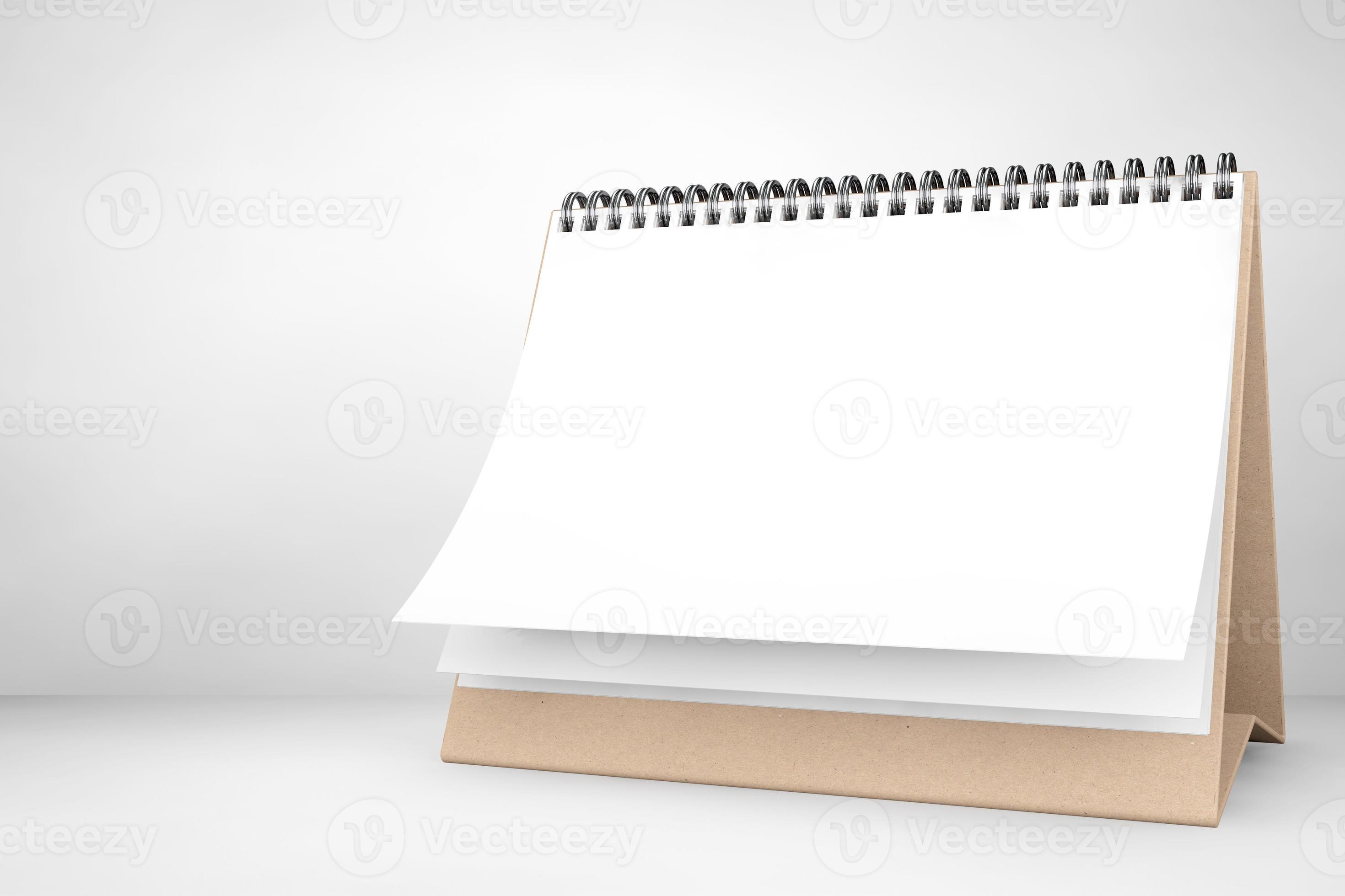 calendário espiral de mesa de papel em branco foto