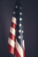 permanente bandeira Estados Unidos da América em background.banner cinza escuro da América em estilo retro. foto