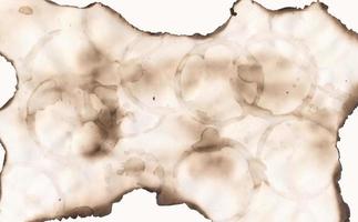 abstrato de papel queimado. efeito de pergaminho de estilo vintage. moldura de bordas rasgadas. selo de caneca de círculo de café foto