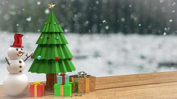 a árvore de natal e o homem de neve na mesa de madeira para celebração de férias ou fundo de negócios de promoção renderização em 3d foto